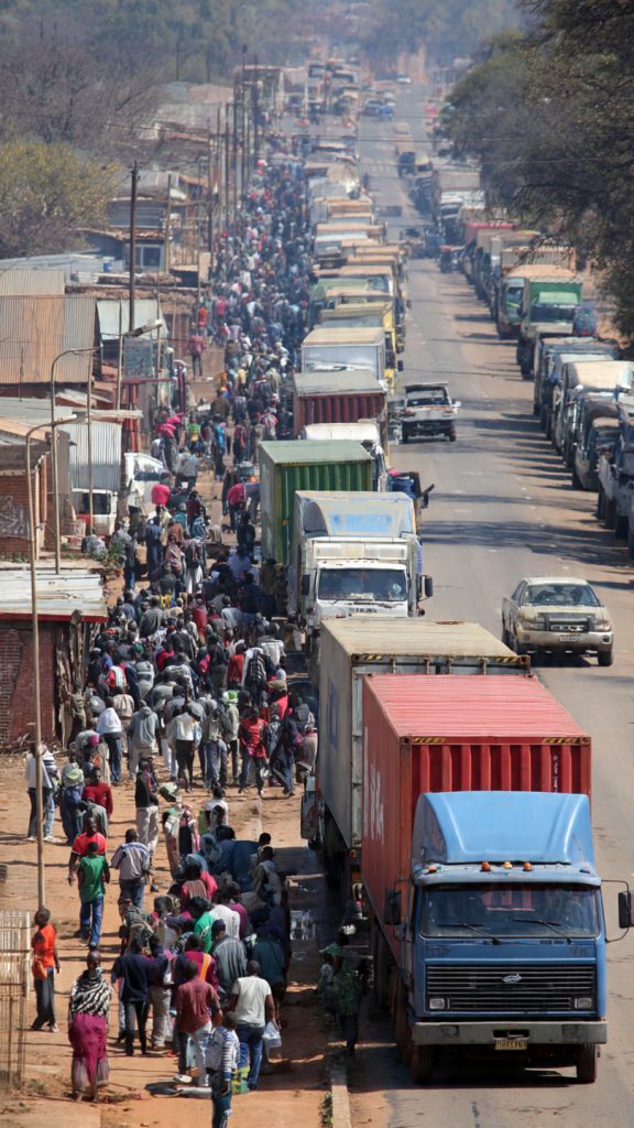 Beitbridge border restrictions, SADC migration, North-South Corridor, regional migration patterns, cross-border trade, informal trade, migrant labour, Zimbabwe-South Africa border, border delays, economic impacts, remittances, labour shortages, migrant health, HIV care, TB treatment, mobile health outreach, micro-traders, seasonal labour migration, border management, migration policy, public health, informal economy, migrant vulnerabilities, gender-sensitive migration, labour mobility, regional integration, border control, undocumented migrants, health systems, cross-border corridors, SADC regional economy, trade facilitation, e-permits, migrant worker rights, migration data, health-migration integration, economic inclusion, corridor efficiency.