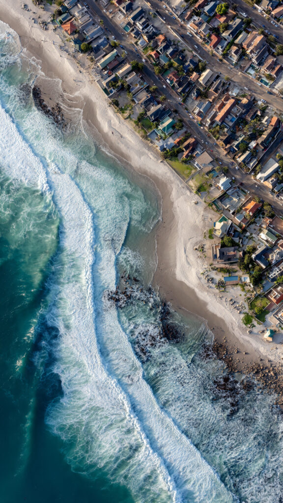 South Africa, coastal communities, rising sea levels, internal displacement, Durban, Gqeberha, Port Elizabeth, informal settlements, migration health, climate change, flooding, storm surges, coastal erosion, urban migration, vulnerable populations, cross-border migrants, internal migrants, disaster risk, public health, housing insecurity, health systems, gender vulnerability, undocumented migrants, climate adaptation, coastal policy, National Coastal Management Programme, CARP, environmental health, relocation, psychosocial stress, infectious diseases, TB, HIV, community resilience, flood mapping, municipal planning, participatory research, disaster preparedness, adaptation strategies, climate-driven migration, migration policy, health outcomes, temporary shelters, livelihoods disruption, informal housing, sanitation, drainage infrastructure, equity, social determinants of health, mobile health services, municipal governance, urban planning, South African policy, health equity.