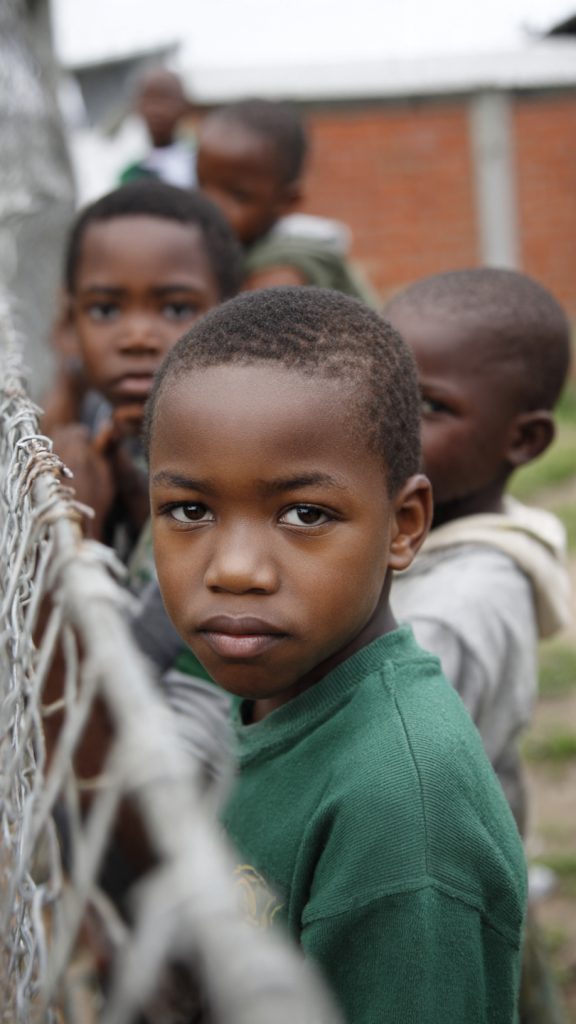 migrant children South Africa, childhood immunisation, vaccine coverage, undocumented children, foreign nationals, public health, national immunisation program, vaccination barriers, healthcare access, xenophobia, informal settlements, mobile clinics, maternal and child health, health equity, vaccine-preventable diseases, measles vaccination, polio vaccination, pertussis vaccination, immunisation policy, South African health policy, Health Justice Initiative, SAPA statement, refugee children, asylum seekers, social determinants of health, healthcare inequality, catch-up immunisation, service delivery gaps, community health programs, migrant health research, health system capacity, clinic accessibility, language barriers, structural barriers, public health interventions, herd immunity, ethical health access, human rights, UN Convention on the Rights of the Child, provincial health departments, integrated child services, outreach vaccination programs, migration-disaggregated data, health policy recommendations, vulnerable populations, South African Department of Health, HIV testing, TB screening, healthcare trust, anti-migrant sentiment, health system governance, immunisation uptake, vaccine stock-outs.