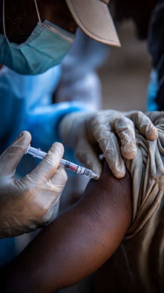 vaccination rights South Africa, migrant vaccination barriers, undocumented migrants healthcare, immunisation policy South Africa, constitutional right to healthcare, Section 27 health rights, access to vaccines migrants, public health migration, migrant children immunisation, COVID-19 vaccination migrants, EPI-SA vaccination program, healthcare discrimination South Africa, xenophobia in healthcare, cross-border migrants South Africa, migrant public health risks, vaccination coverage gaps, migrant health rights, health system barriers migrants, legal entitlement to healthcare SA, migrant inclusion in public health, vaccination programme equity, healthcare access Constitution SA, migrant exclusion impact, migrant immunisation statistics, vulnerable populations vaccination, vaccination outreach strategies, rights-based public health, policy reform migrant healthcare, national immunisation challenges, SA Health Department migrant access, emergency healthcare undocumented, community health organisations migrants, migrant health surveillance, migrant disease prevention, immunisation legal framework South Africa